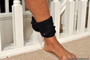 18 year old female Doris G slips off her underwear to pose naked on her bed